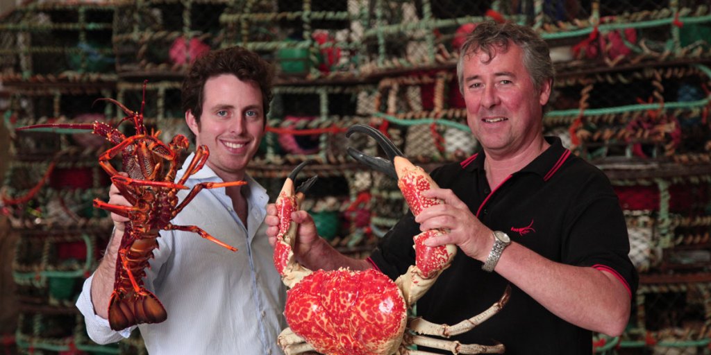 Andrew Ferguson (right) in Ferguson Australia’s Kangaroo Island facility with visiting German fish industry executive Anton Faber-Castell.
