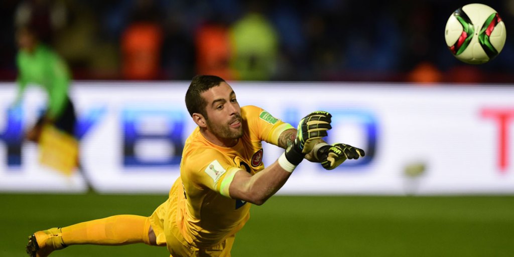 Wanderers' goalkeeper Dean Bouzanis stops a ball during match against ES Setif.