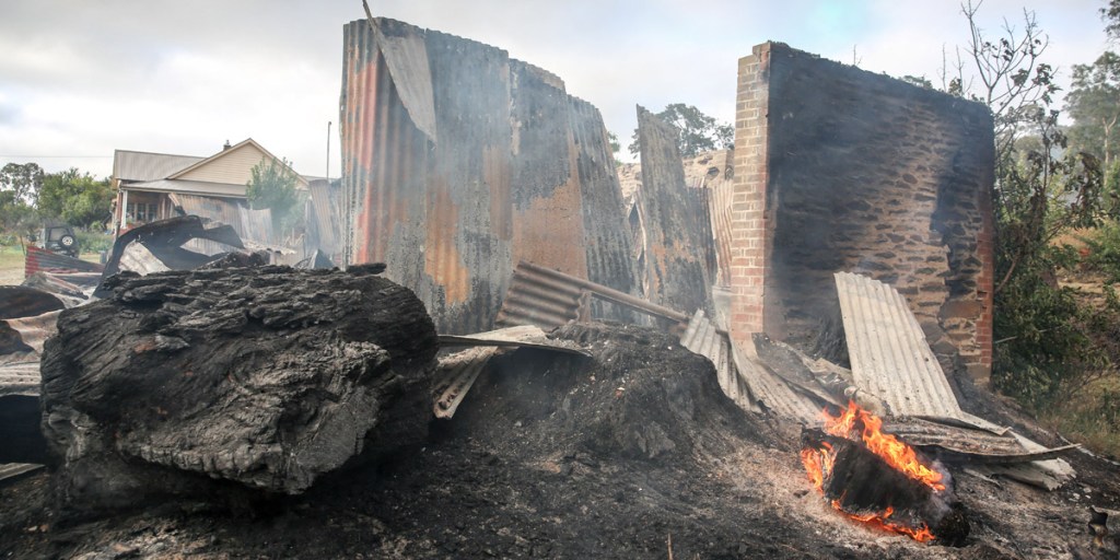 The burnt-out remains of a property in Gumeracha. Photo: AAP