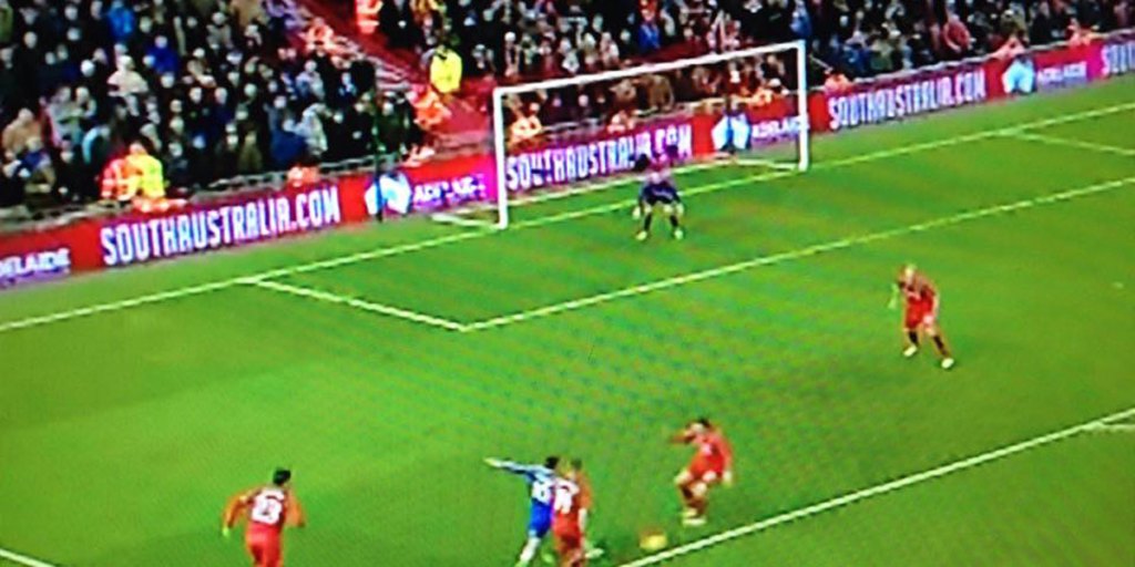 A screenshot of the action at Anfield overnight, with the South Australian advertising prominent behind the goal line.