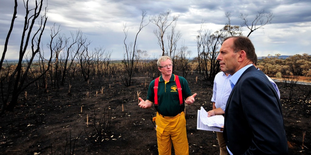 Prime Minister Tony Abbott tours the fire ground this morning.