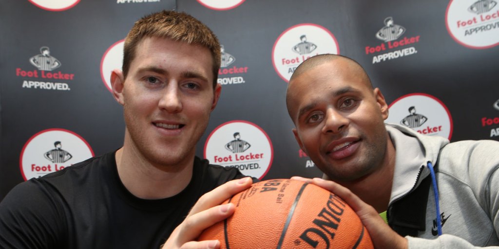 Australian San Antonio Spurs basketball stars Aron Baynes (left) and Patty Mills.