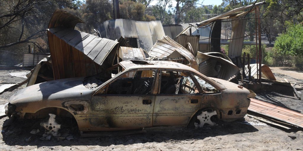 A burnt out car and shed near Kersbrook.