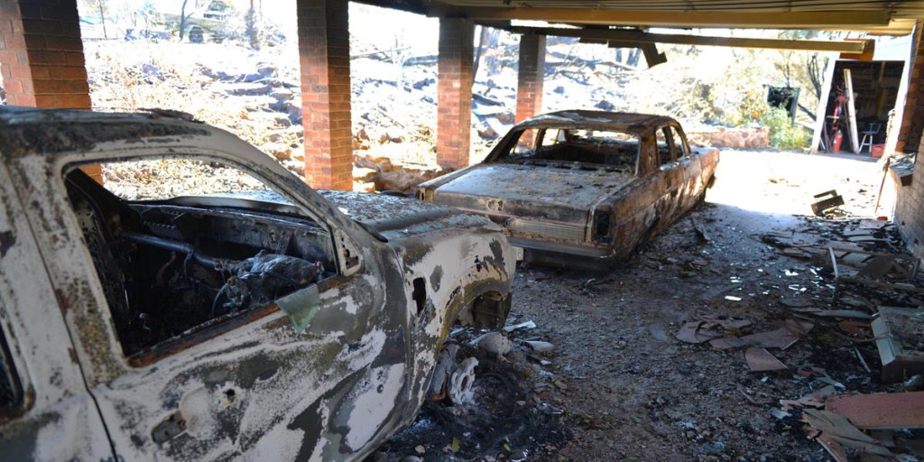 Destroyed cars at a property near Kersbrook.