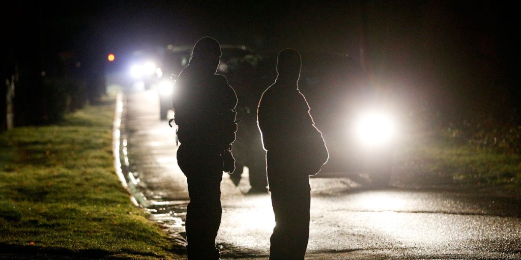 French police officers stand at a check point in Longpont, near Villers Cotterets, north-east of Paris.