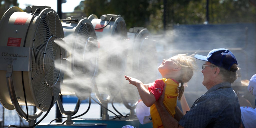 Tennis fans cool off during a heatwave at last year's Australian Open tennis tournament in Melbourne.