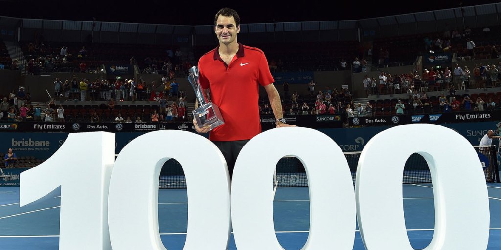 Roger Federer celebrates the 1000th victory of his career.
