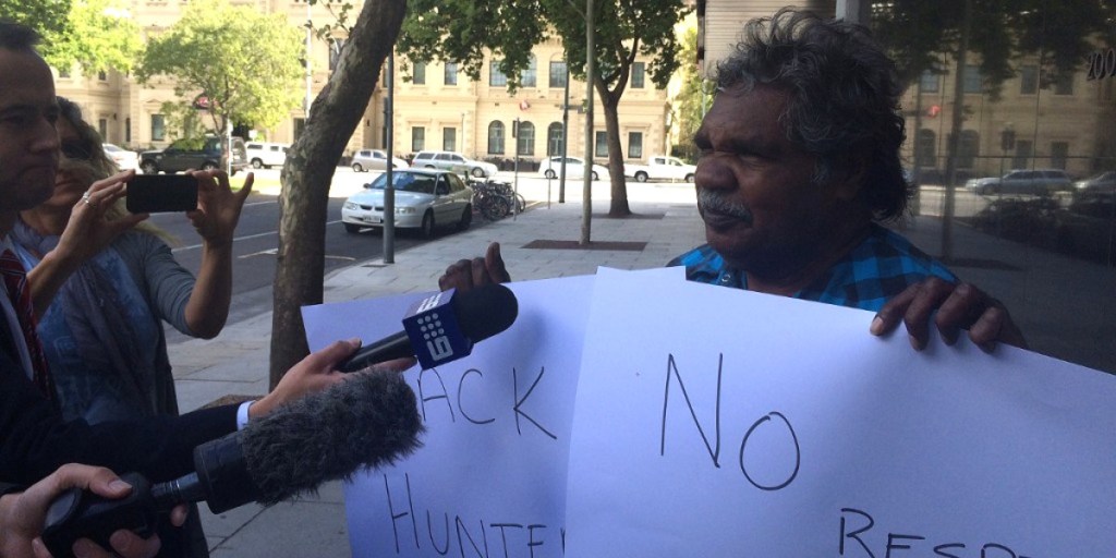 APY Chairman Owen Burton protesting the State Government's funding freeze earlier this month.