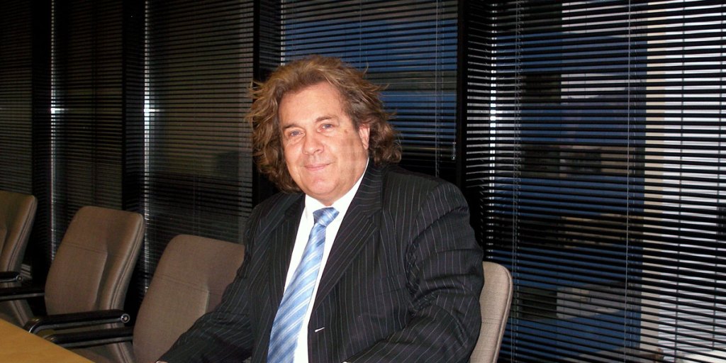 Russell Wortley denies he used threatening and foul language towards a veteran reporter.