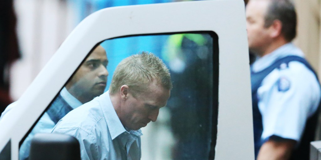 Adrian Ernest Bayley being taken from a prison van and led into the Melbourne Supreme court in 2013. Photo: AAP