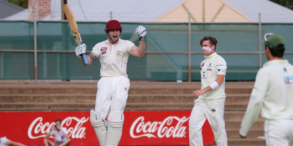 Brad Evans celebrates after hitting the winning runs. Photo: Peter Argent/InDaily