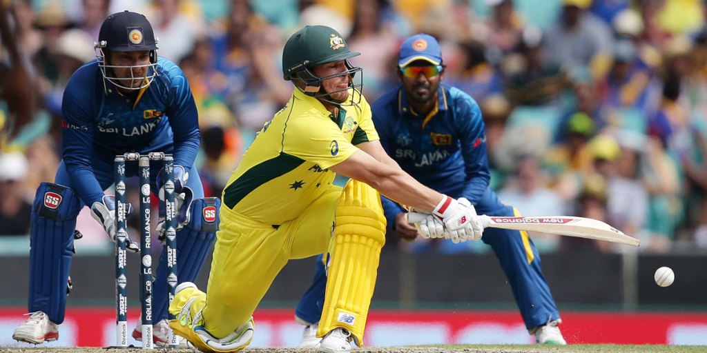 Aaron Finch sweeps against Sri Lanka in a World Cup pool match.