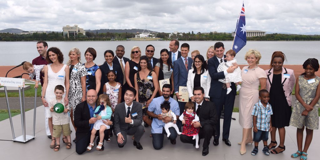 Prime Minister Tony Abbott with newly sworn-in citizens at an Australia Day citizenship ceremony in Canberra this year.