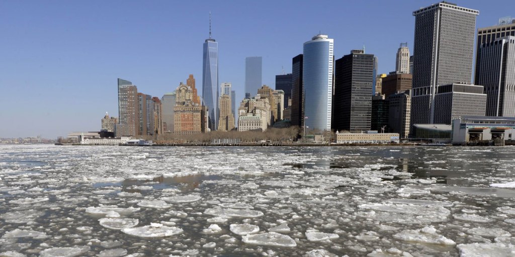 A view of Lower Manhattan from the Staten Island Ferry as the New York Harbor is filled with large chunks of ice.