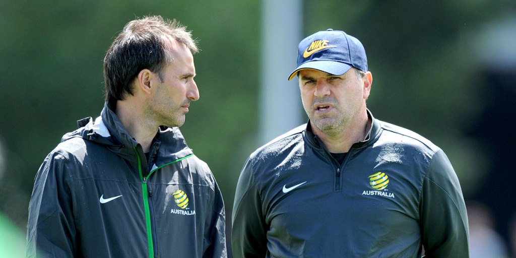 Olyroos coach Aurelio Vidmar (left) with Socceroos head coach Ange Postecoglou.