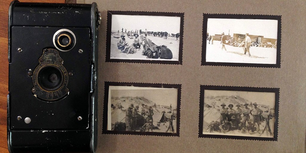 Photos in Mac's album and the camera he took to Egypt.