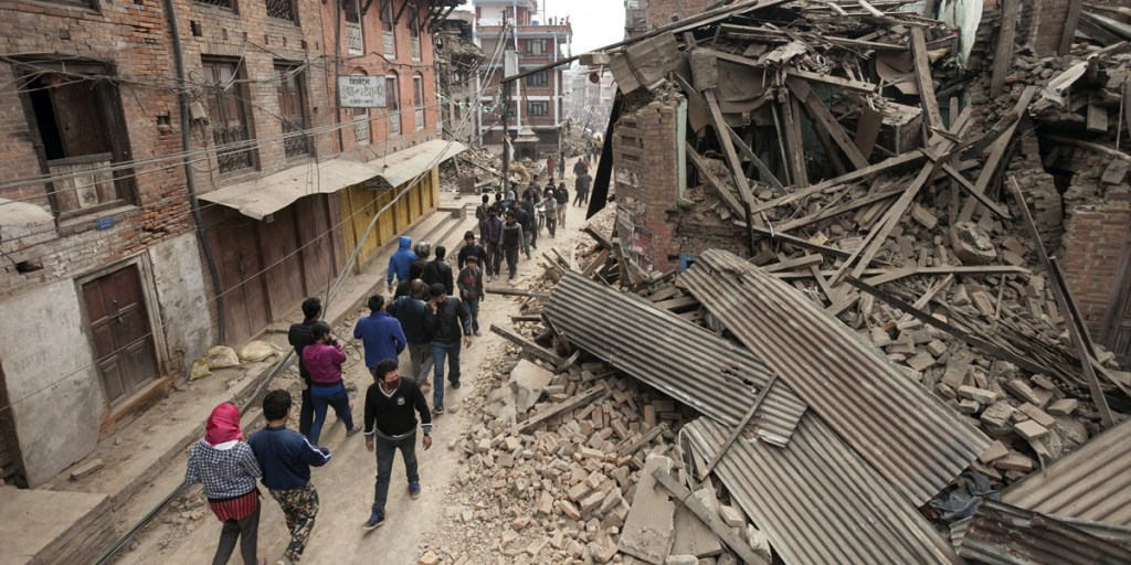 Nepal tragedy: Dwellings have collapsed under clouds of dust. Photo: AAP