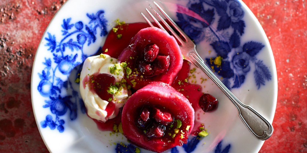 Poached quinces with sour cherries and clotted cream. Photo: supplied