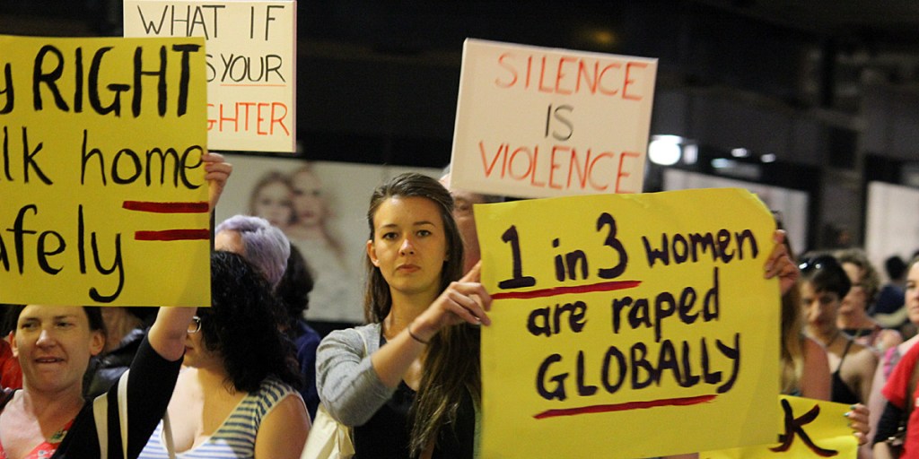Protesters call for an end to sexual violence at the Reclaim the Night rally. Photo: AAP