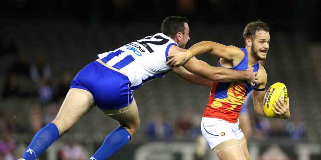 Brisbane's James Aish (right)