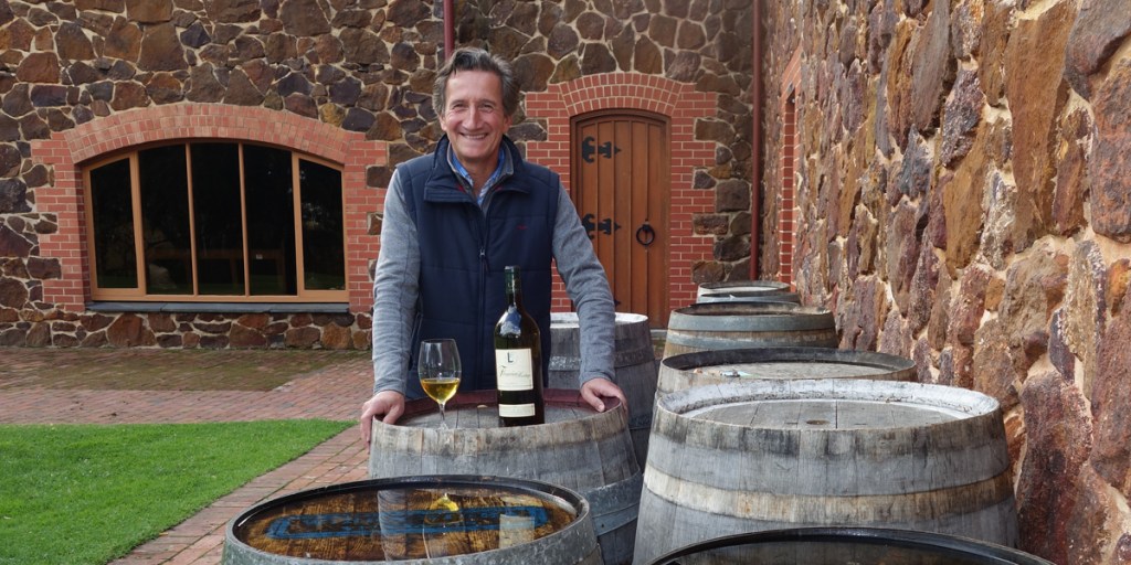 Jacques Lurton with his 1990 Fleurieu Heritage Semillon at Wirra Wirra. Photo: Philip White