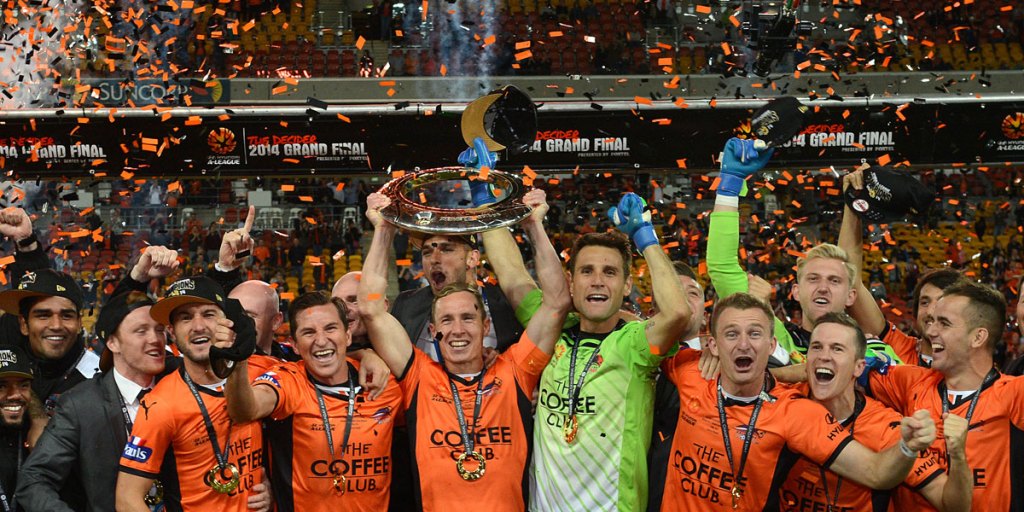 Brisbane Roar players celebrate their victory in last year's A-League grand final. AAP image