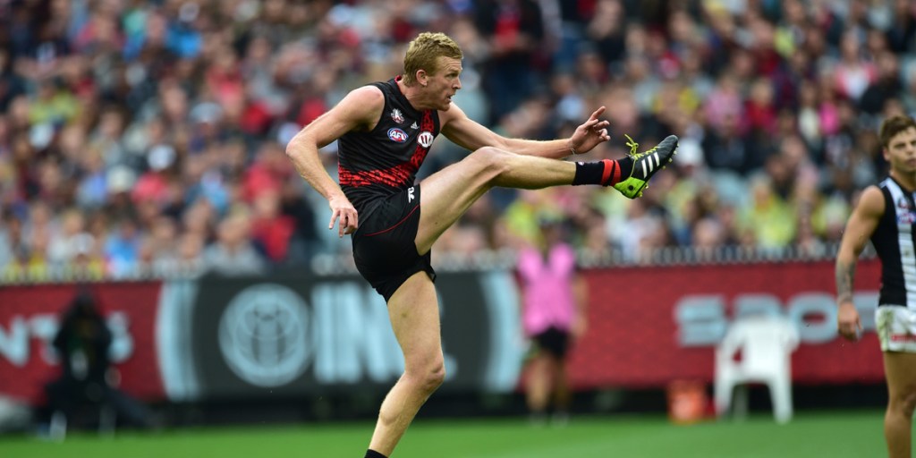 The veteran backman Dustin Fletcher kicking a goal in this year's Anzac Day clash.