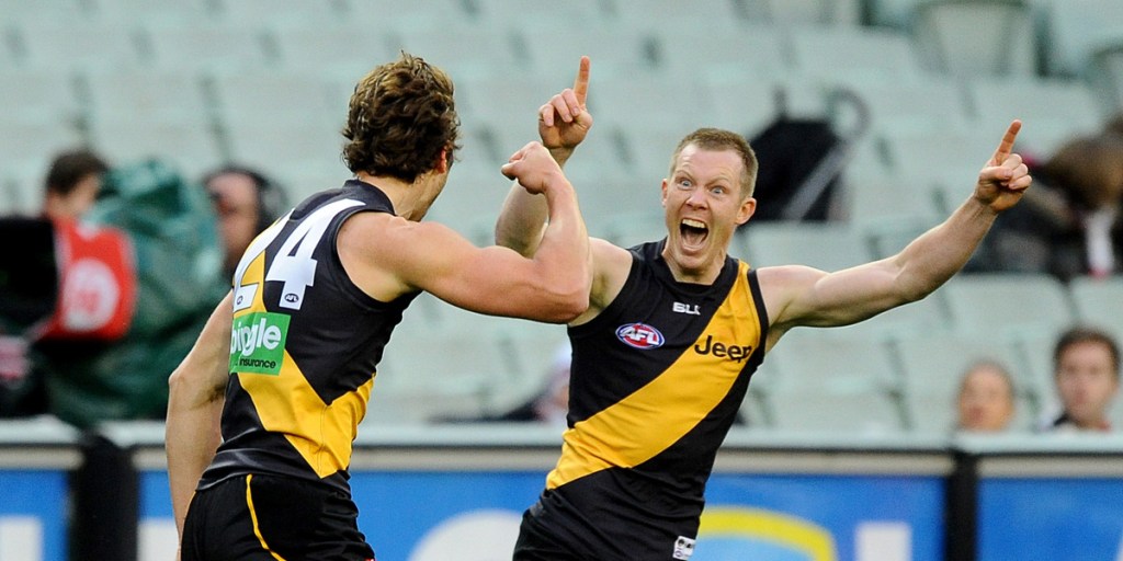 Ben Griffiths (left) celebrates with Jack Riewoldt during a 2014 match.