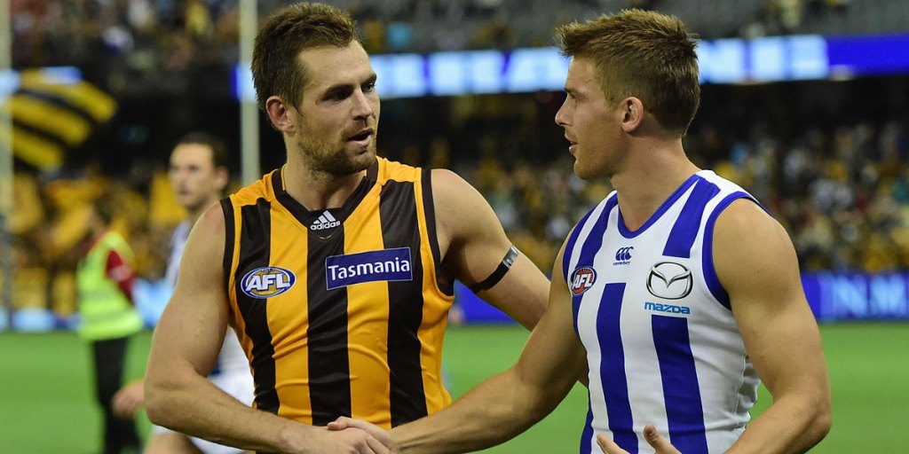 Luke Hodge (left) in conciliatory mode with Andrew Swallow after the fiery match.