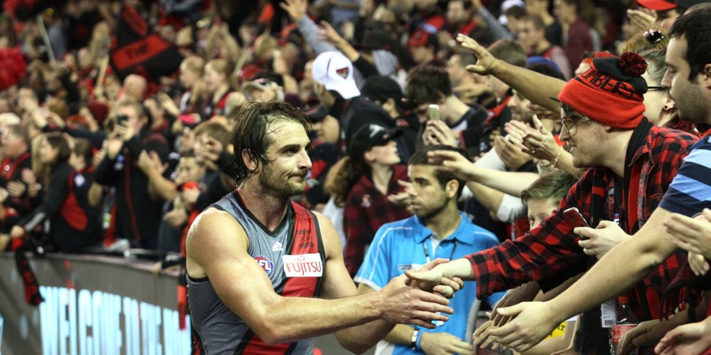 Jobe Watson with fans after a win this year.
