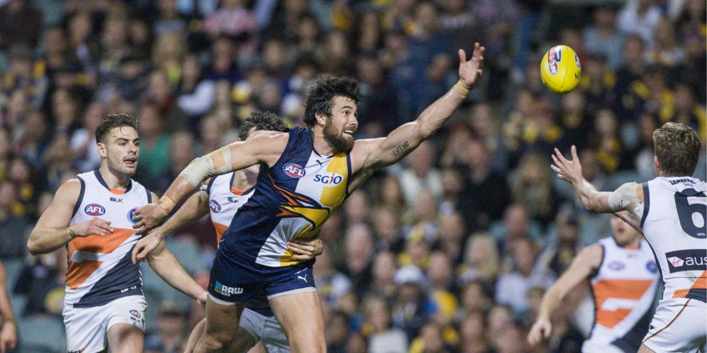 Josh Kennedy on his way to kicking six goals against GWS.
