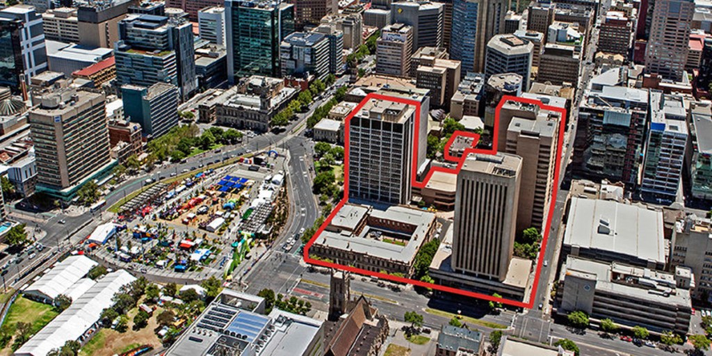 The real estate listing shows the entire precinct for sale - including the historic Torrens Building (front left).