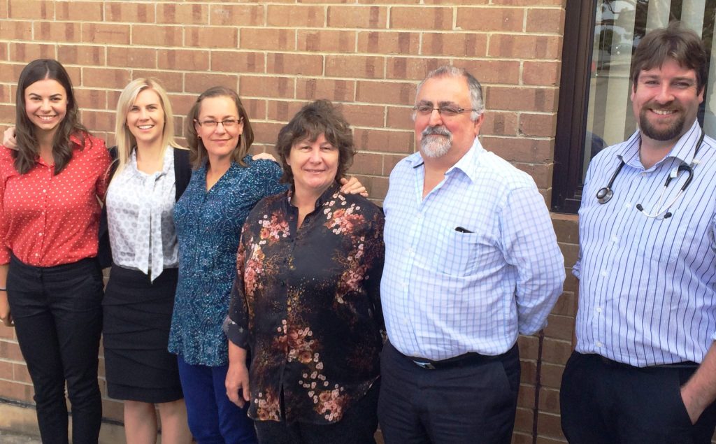 Dr Frank Maldari and Dr Sarah Mahoney (second and third from right) at Christies Beach Medical Centre, with current OCEP student Laura Gellie, and past OCEP students, Dr Belinda Rowland, Dr Kay Flynn, and Dr Chris Hunt.