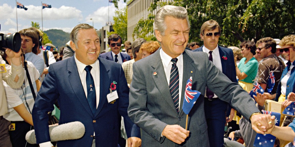 Alan Bond with Prime Minister Bob Hawke at a reception to congratulate the crew of Australia II in Canberra, 1983. 