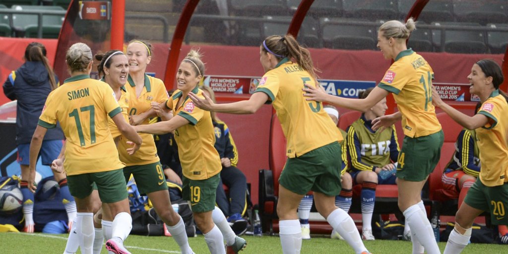 Lisa De Vanna (second from left) celebrates her goal against Sweden.