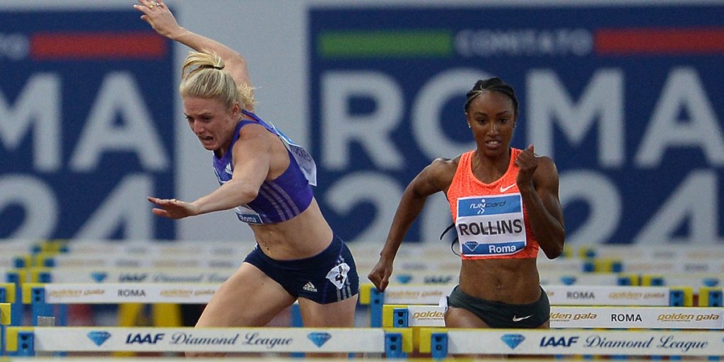 Australian Sally Pearson (left) gets into strife during the 100m hurdles event at the Stadio Olimpico in Rome. 