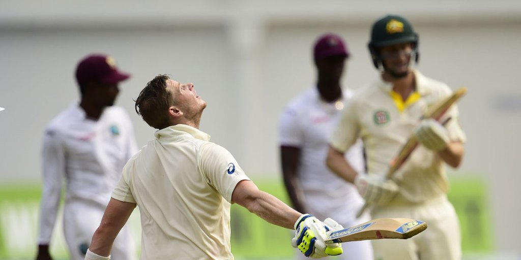 Steve Smith looks skyward after reaching his century. 