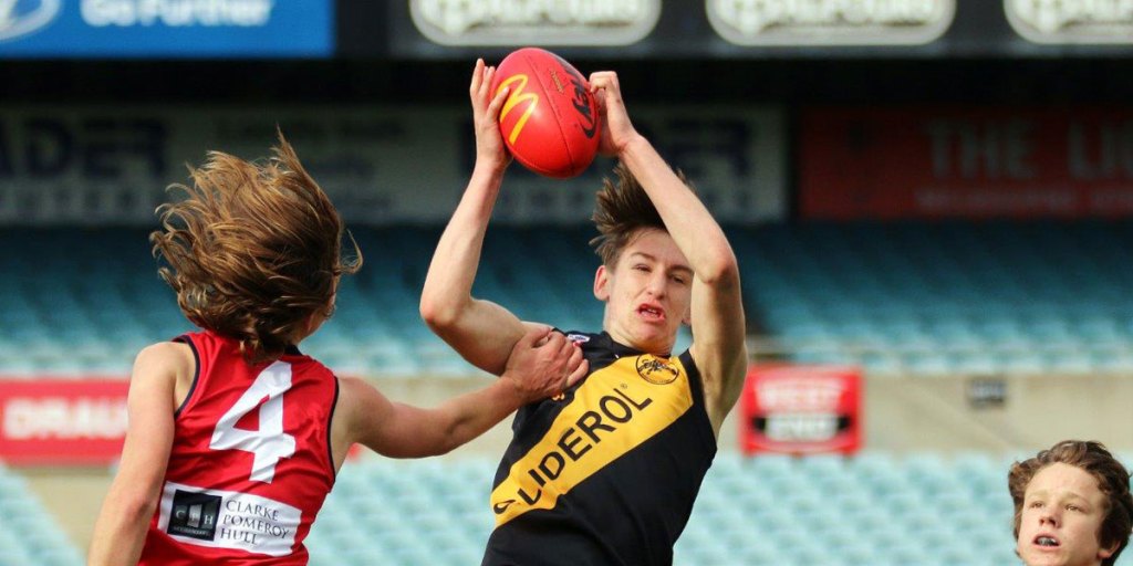 Bays footballer Declan Carmody taking a strong mark in the SANFL Under 15s Country grand final. Photo: Peter Argent
