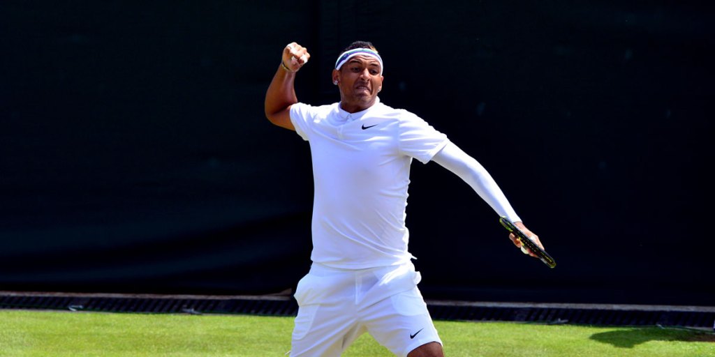 Nick Kyrgios celebrates a break of serve during his match against Milos Raonic at Wimbledon.