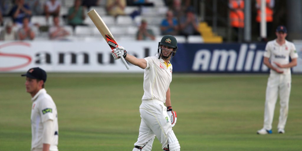 Australia batsman Mitch Marsh celebrates his 100 not out during the tour match at the Essex County Ground, Chelmsford.