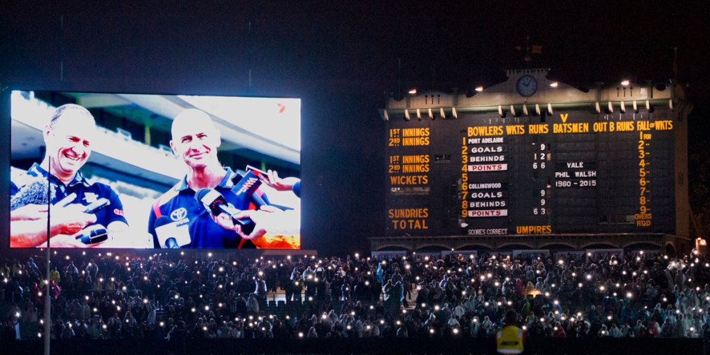 The lights were dimmed and fans held their mobile phones aloft as the song "Lanterns" was played at the end of last night's match. Photo: Michael Errey/InDaily