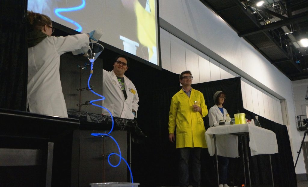 Dr Justin Chalker, centre, with some of this team of performing Flinders University scientists. 