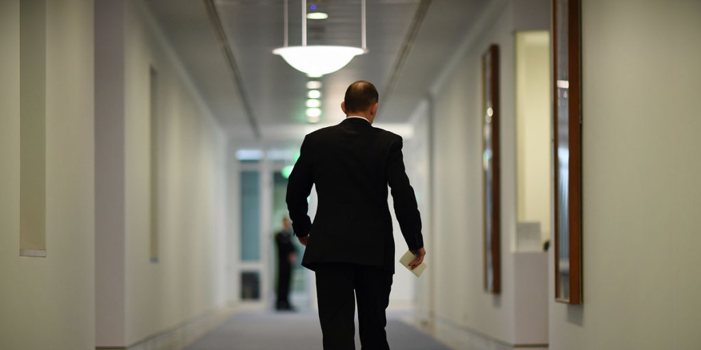 Prime Minister Tony Abbott leaves a media conference after announcing the Coalition's position on a same sex marriage conscience vote.