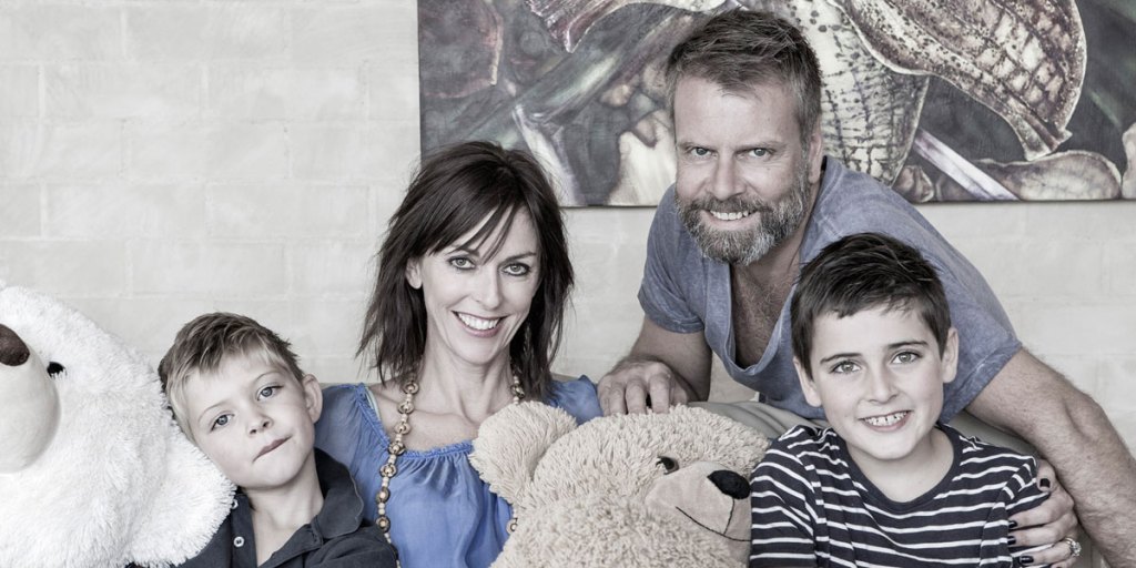 Morry Bailes with wife Melanie and sons Charlie (left) and Hugo (right). 