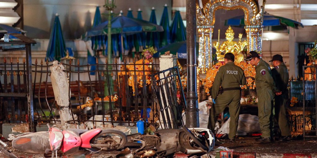 Police officers at the scene of an explosion near Erawan Shrine in central Bangkok, Thailand.
