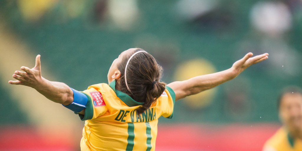 Lisa De Vanna celebrates after scoring in the opening minutes of Australia's Group D match against Sweden at the World Cup in June.