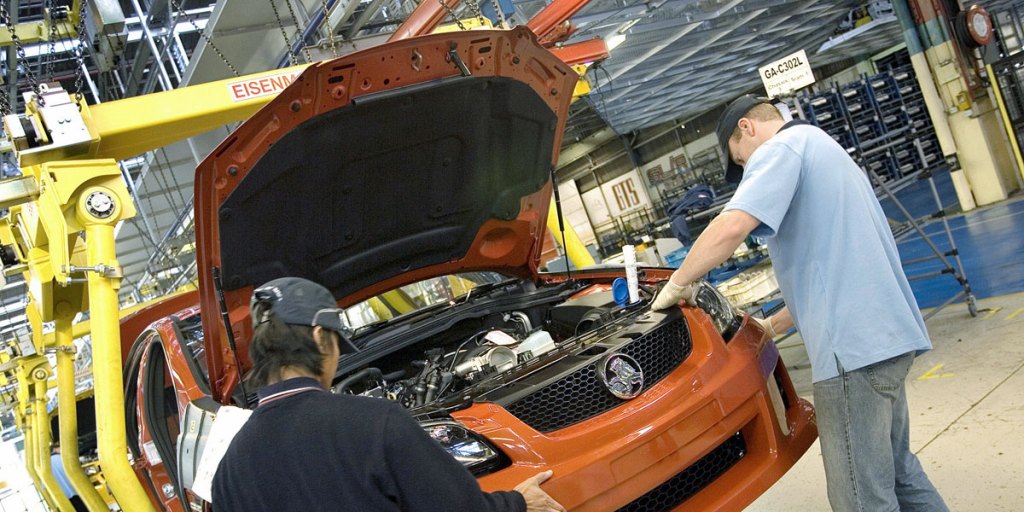 Workers on the line at Holden's Elizabeth factory. 