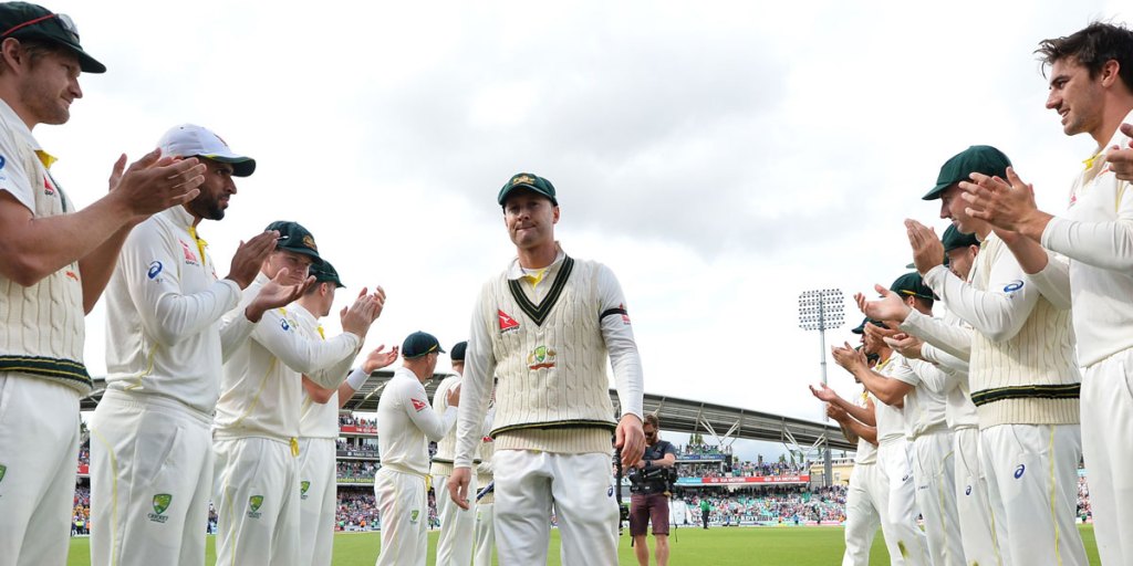 Australian players make a guard of honour for retiring captain Michael Clarke at the end of The Oval Test.