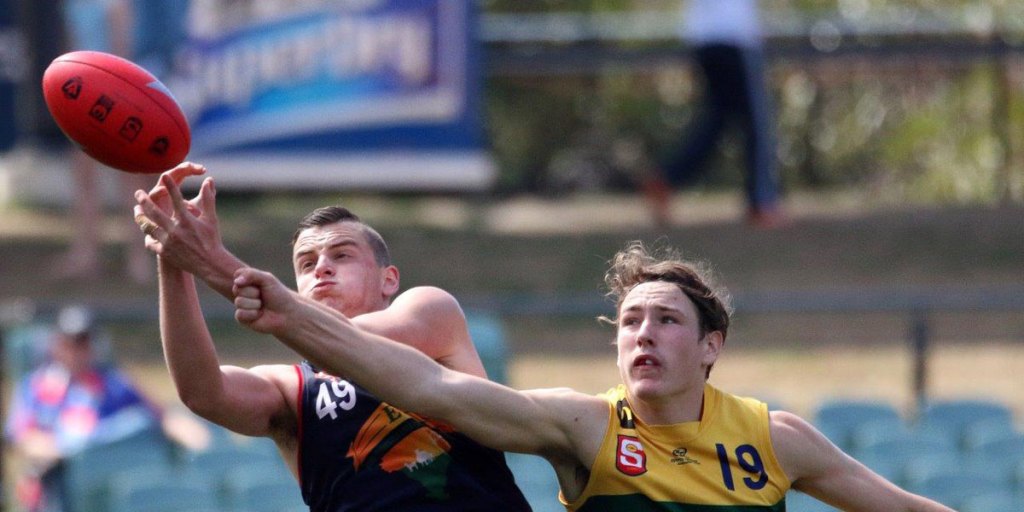 Lachlan Pascoe (left) in action for the Norwood Under 18 side. Photo: Peter Argent