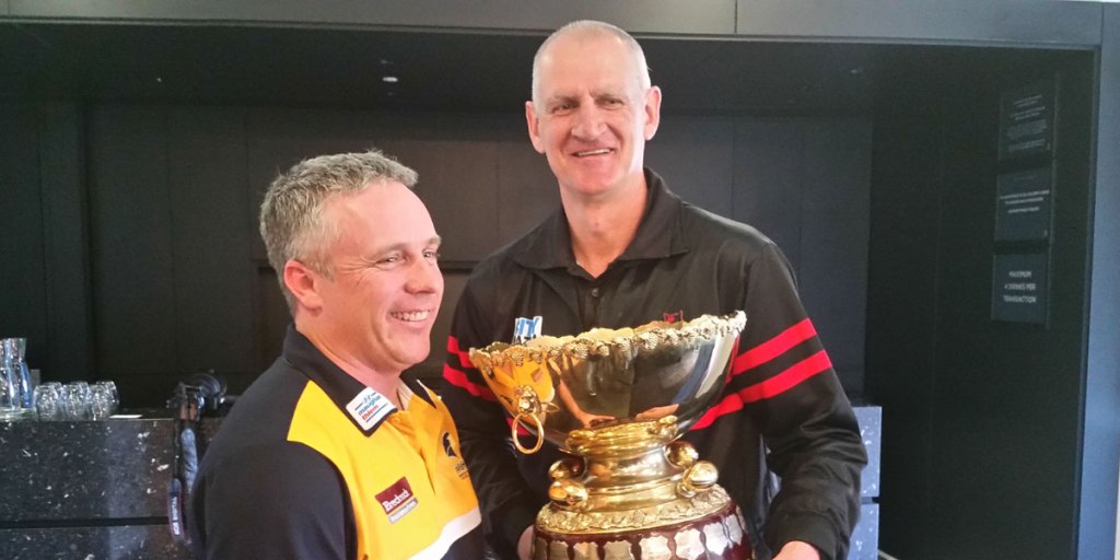 Eagles coach Michael Godden and Bloods mentor Mark Mickan.